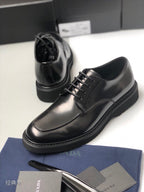 Prada unisex lace-up shoes, black leather, thick tread sole and lace-up front
