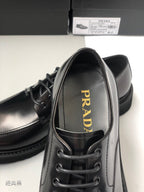 Prada unisex oxford shoes, black leather, PRADA logo patch on tongue