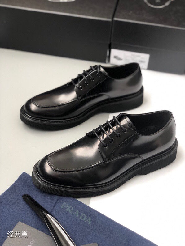 Prada unisex lace-up shoes, black leather, rounded toe and chunky platform sole