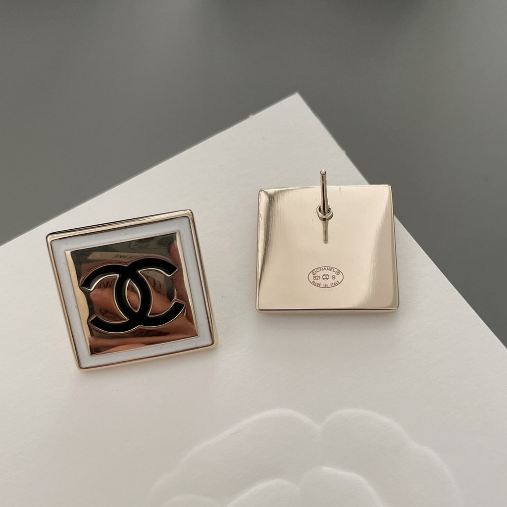 Chanel stud earrings pair showing one front and one back with fastening post