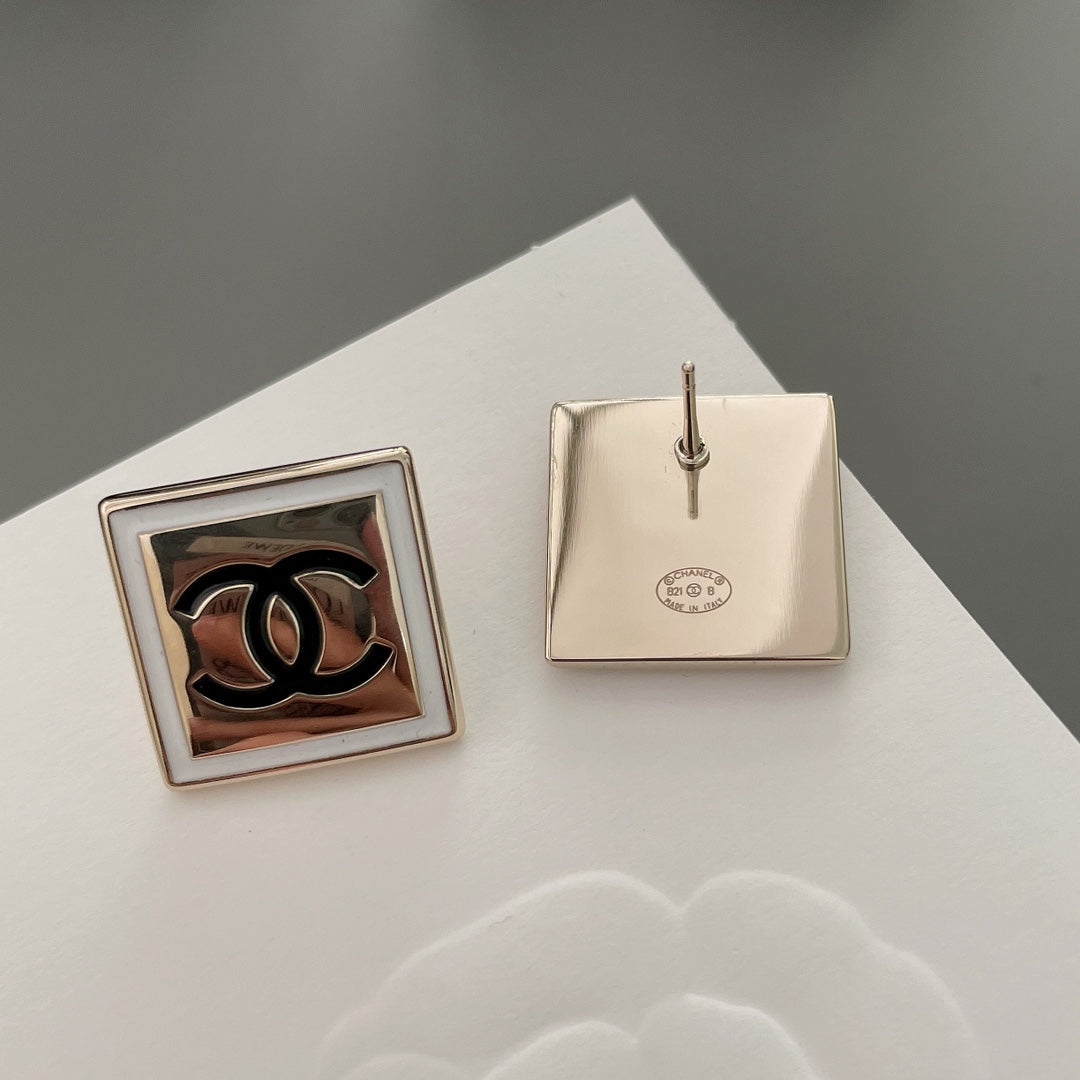 Chanel stud earrings pair showing one front and one back with fastening post