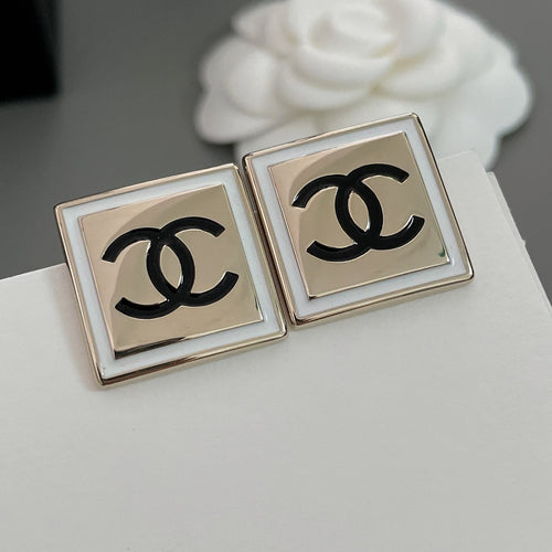Chanel stud earrings with square frames and black CC logo on front faces