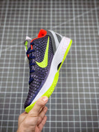 Navy basketball sneaker with neon green outsole and swoosh, red collar and tongue