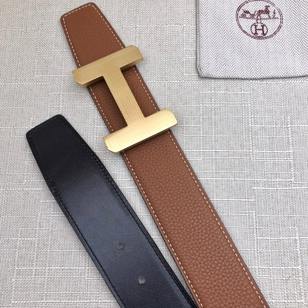 Brown and black leather belt straps with light gold H buckle
