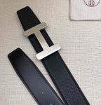 Hermes belt with silver-tone H buckle and matching dark leather strap