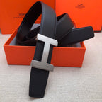 Hermes belt in dark leather with silver-tone H buckle and textured strap