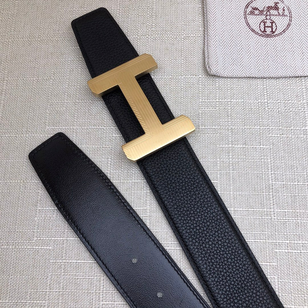 Hermes belt with gold-tone H buckle and matching dark leather strap
