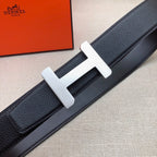 Hermes belt close-up: silver-tone H buckle on dark leather strap