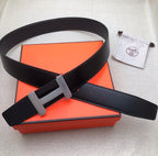Hermes belt in dark leather with silver-tone H buckle and long strap