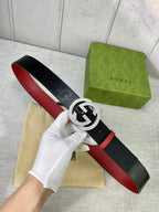 Gucci belt, black and red reversible strap with silver-toned buckle