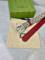 Gucci belt with GG canvas, red leather strap, silver-toned interlocking buckle and dust bag