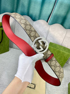Gucci belt with GG canvas, red leather strap, round silver-toned interlocking buckle