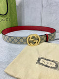 GG canvas belt with red leather trim and gold-toned interlocking buckle