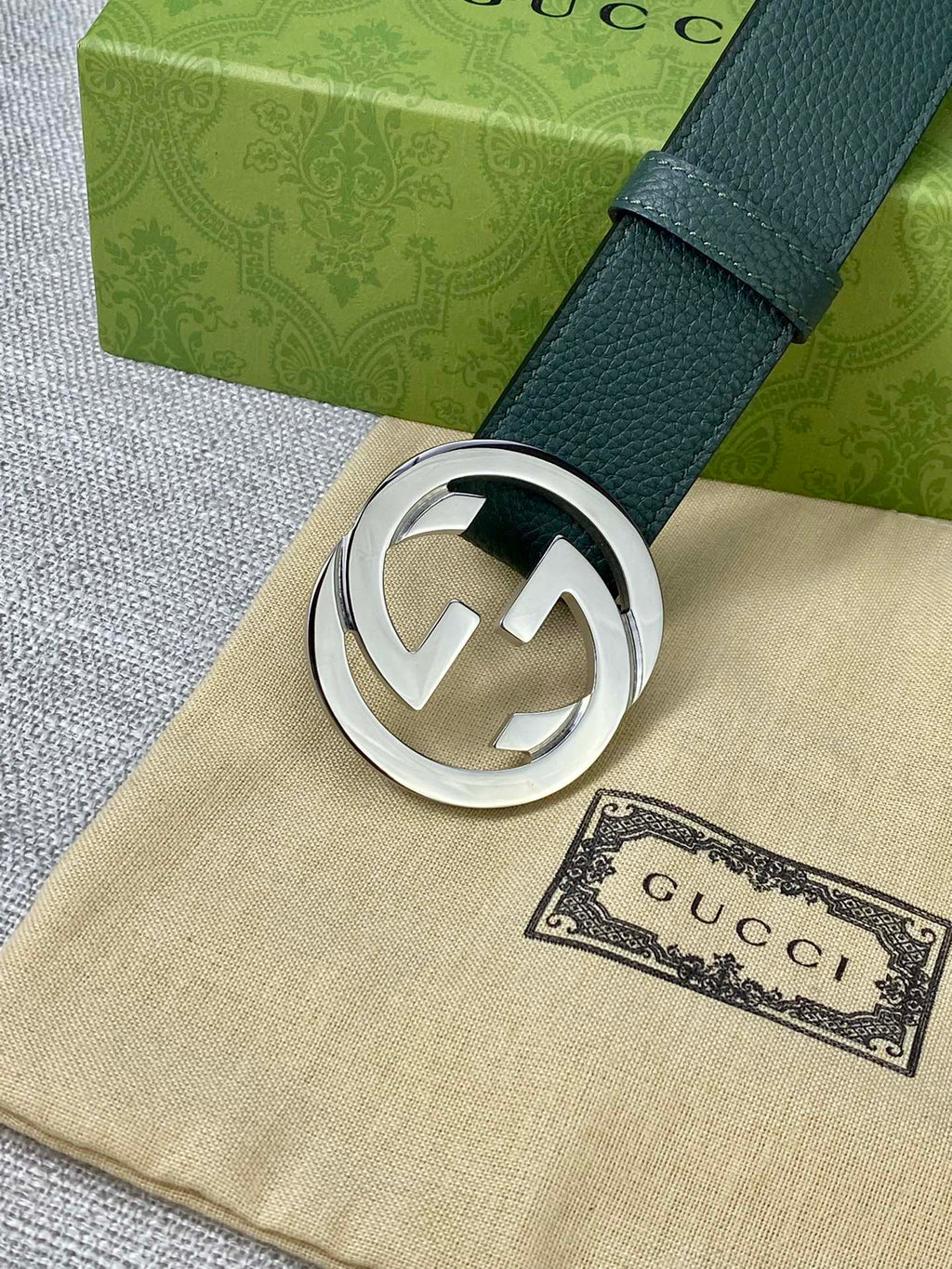 Gucci belt in dark green leather with silver-toned GG buckle
