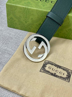Gucci belt in dark green leather with silver-toned GG buckle