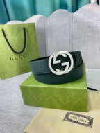 Gucci belt in dark green leather with silver-toned GG buckle ring