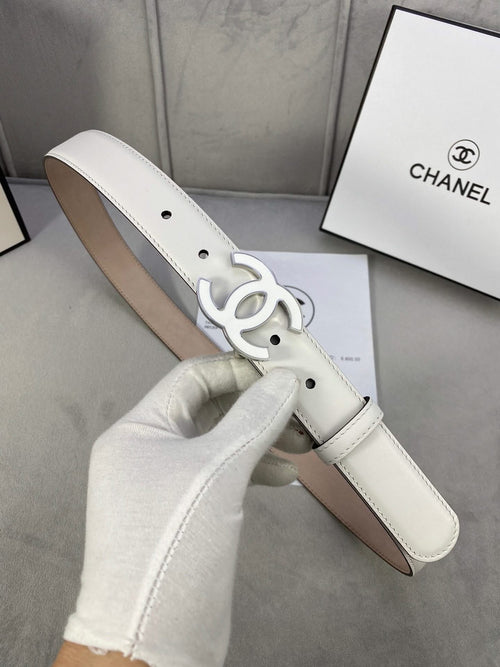 White leather belt with silver CC buckle and perforated adjustment holes