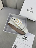 White leather belt with gold CC buckle, placed in a box