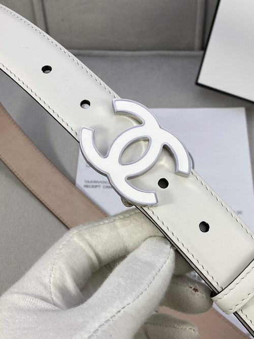White leather belt with silver CC buckle detail and centered adjustment holes