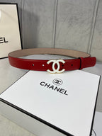 Red leather Chanel belt with gold-tone CC buckle and punched holes