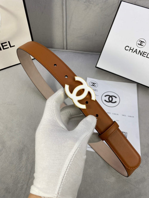Chanel belt in tan leather with gold-tone interlocking CC buckle and punched holes