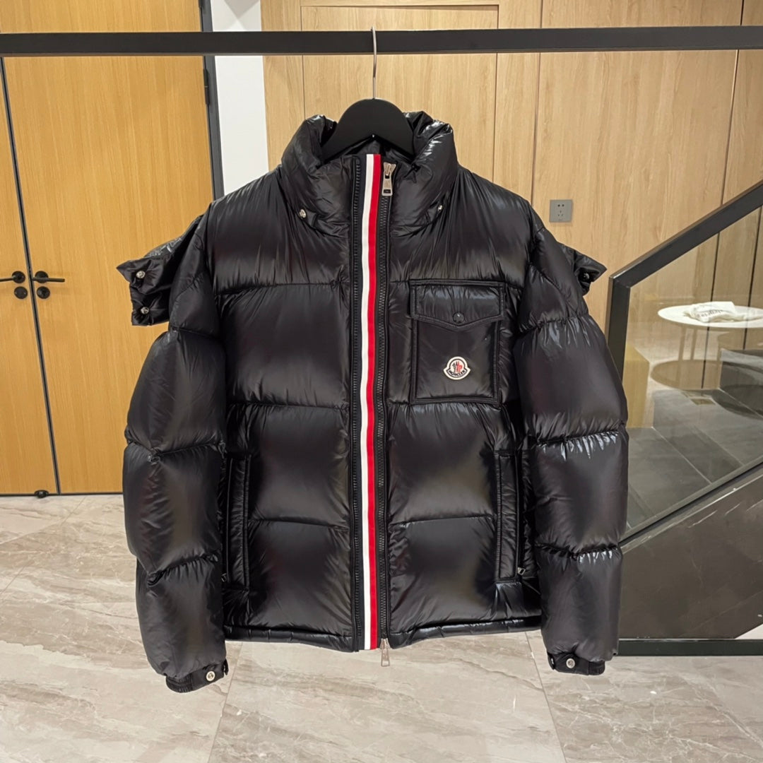 Moncler long puffer jacket front, dark with hood and zip pocket detail