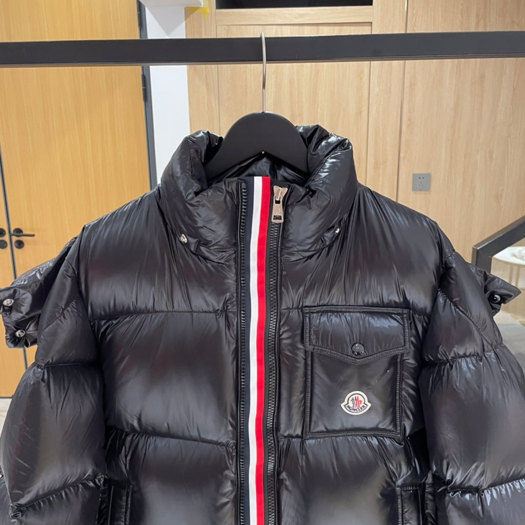 Moncler long puffer jacket close front, dark with hood and chest logo patch