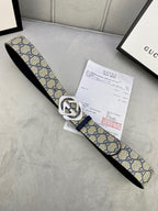 Canvas GG monogram belt with navy/blue strap, white edge trim, silver buckle