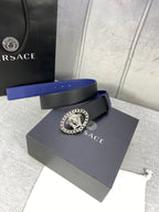 Leather belt with black and blue design, silver Medusa buckle