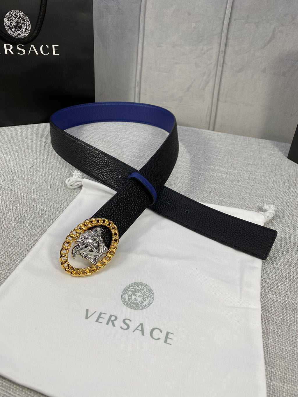 Leather belt with black strap, blue lining, gold Medusa buckle