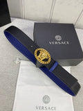 Leather belt with black textured strap, blue edge, gold Medusa buckle