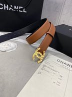Chanel belt tan-brown leather with gold CHANEL buckle on display with receipt