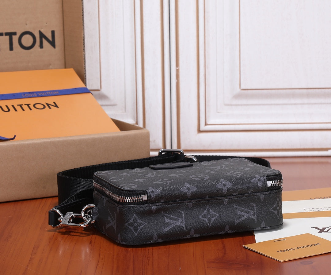 Louis Vuitton crossbody bag, dark monogram canvas with top handle and zipped profile