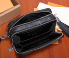 Louis Vuitton bag interior view with black lining and multiple zip compartments
