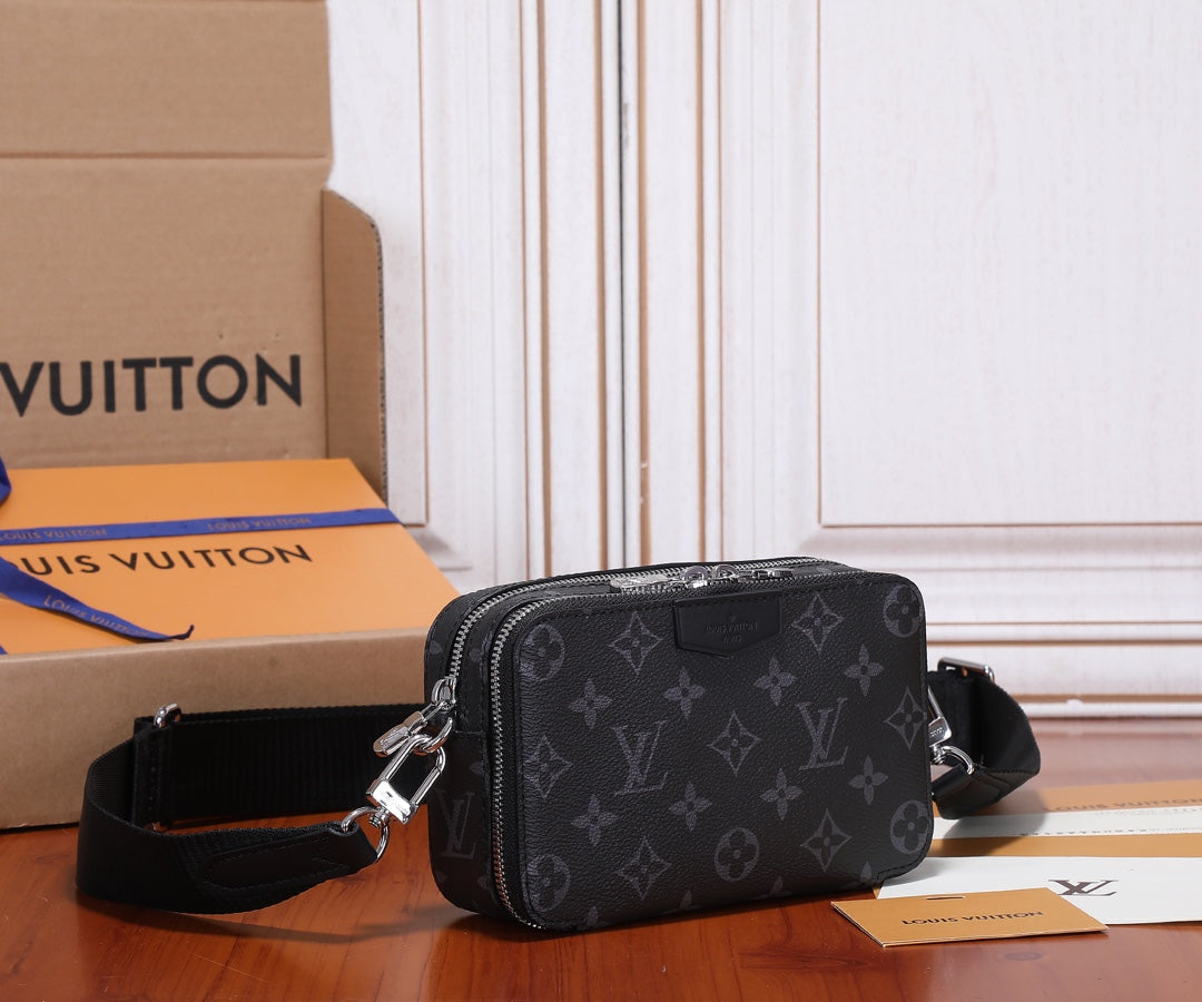 Louis Vuitton crossbody bag, dark monogram canvas front with zipper and shoulder strap