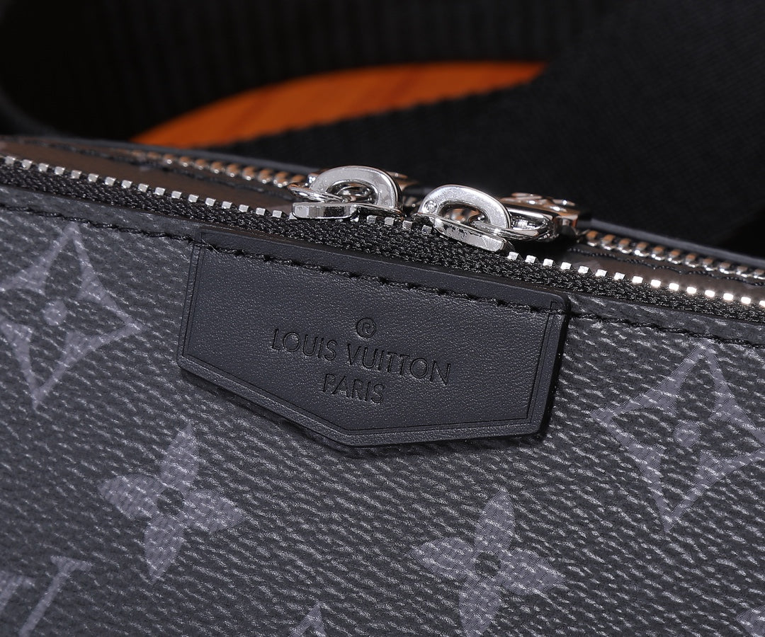 Louis Vuitton bag leather label patch on dark monogram canvas with zip-top