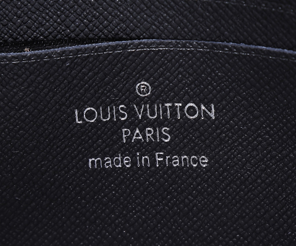 Louis Vuitton Paris "made in France" embossed on black leather patch