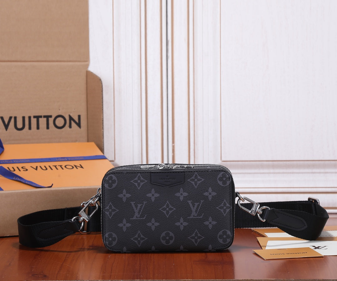 Louis Vuitton crossbody bag in dark monogram canvas with top zip and black strap