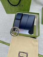 Navy blue leather belt in box with round double-G logo buckle