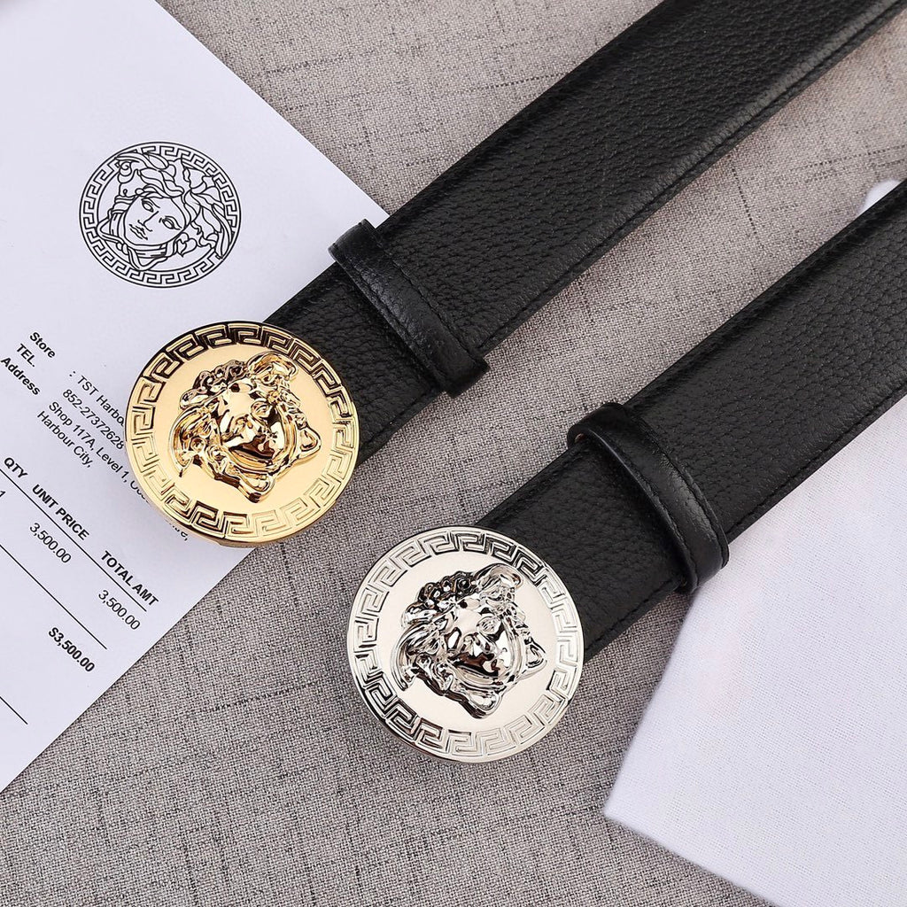 Versace belt pair with black leather straps and Medusa round buckles in gold and silver