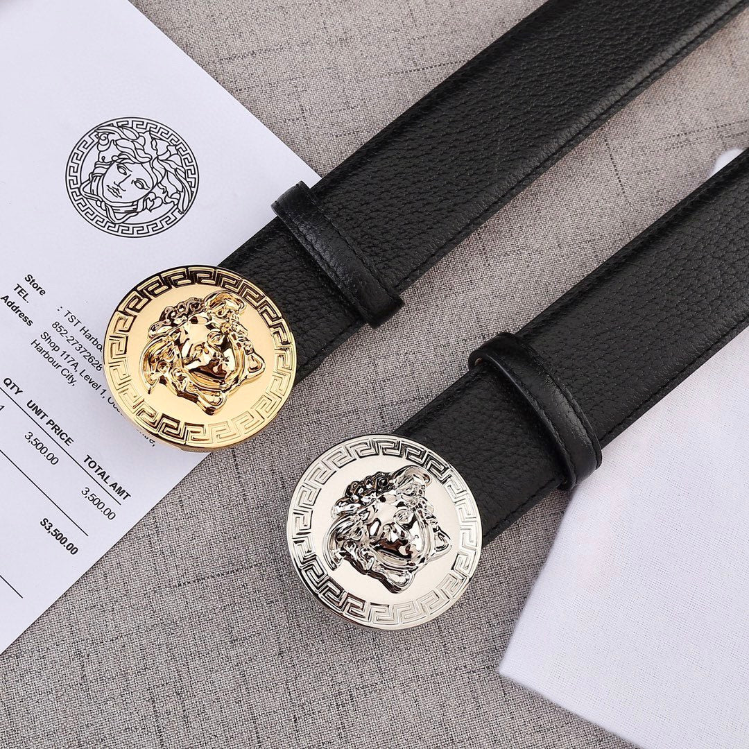 Versace belt pair with black leather straps and Medusa round buckles in gold and silver