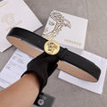 Versace belt in black leather with gold Medusa-style round buckle, adjustable holes