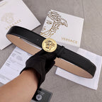 Versace belt in black leather with gold Medusa-style round buckle, adjustable holes