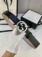 Black monogram leather belt with silver double-G buckle