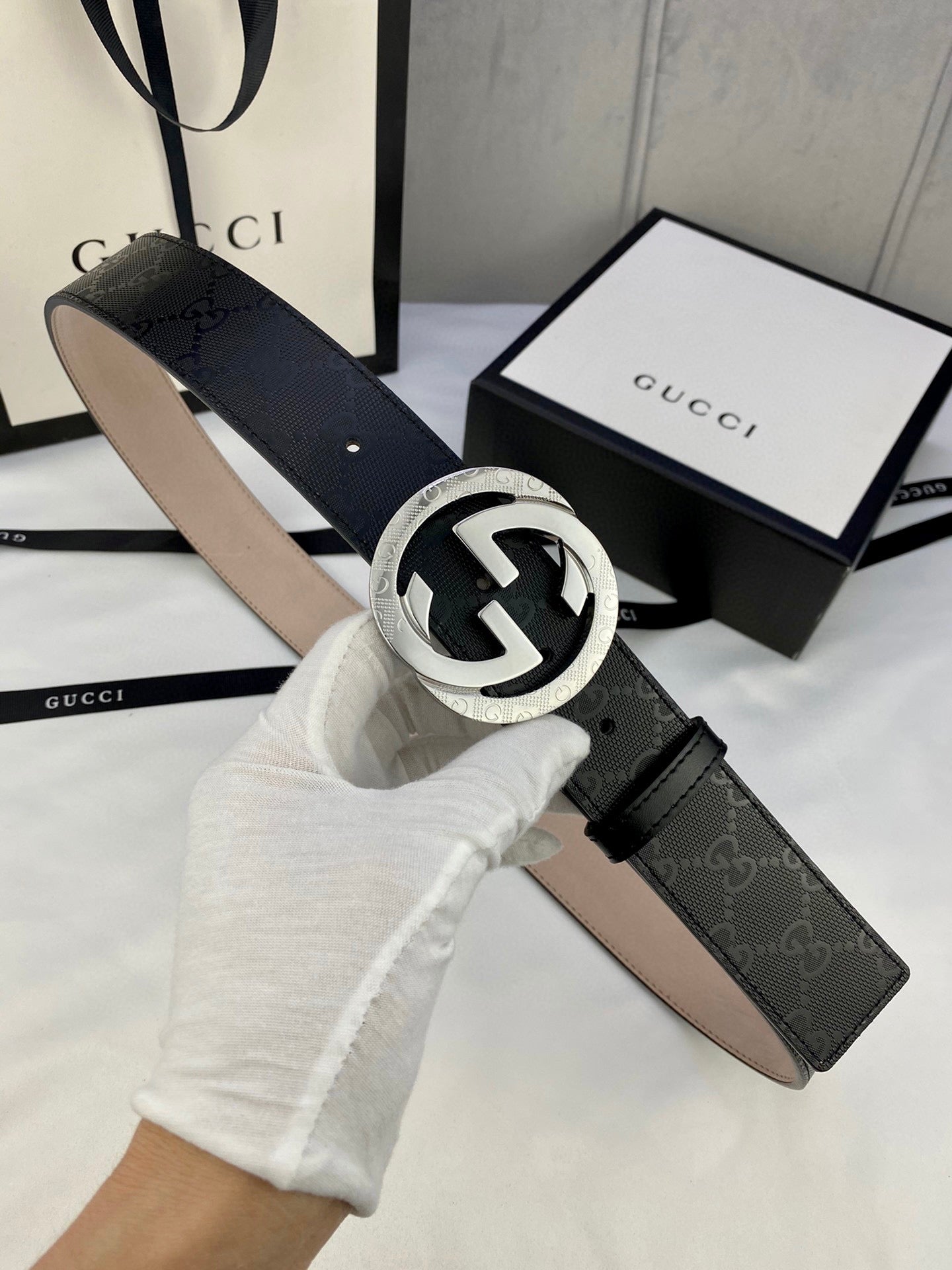 Black monogram leather belt with silver double-G buckle