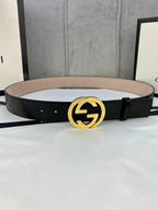 Black monogram leather belt with gold double-G buckle