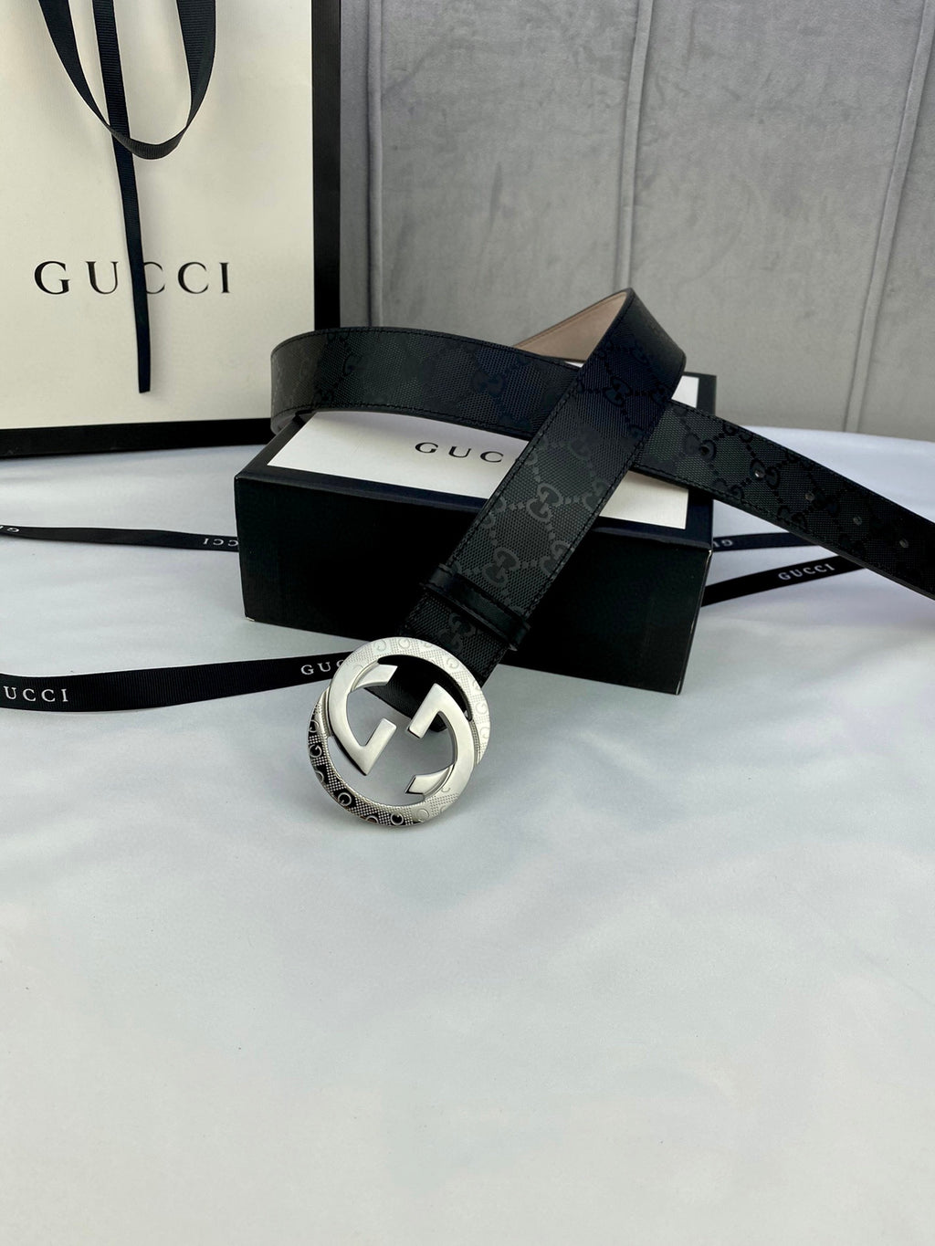 Black monogram leather belt with silver double-G buckle
