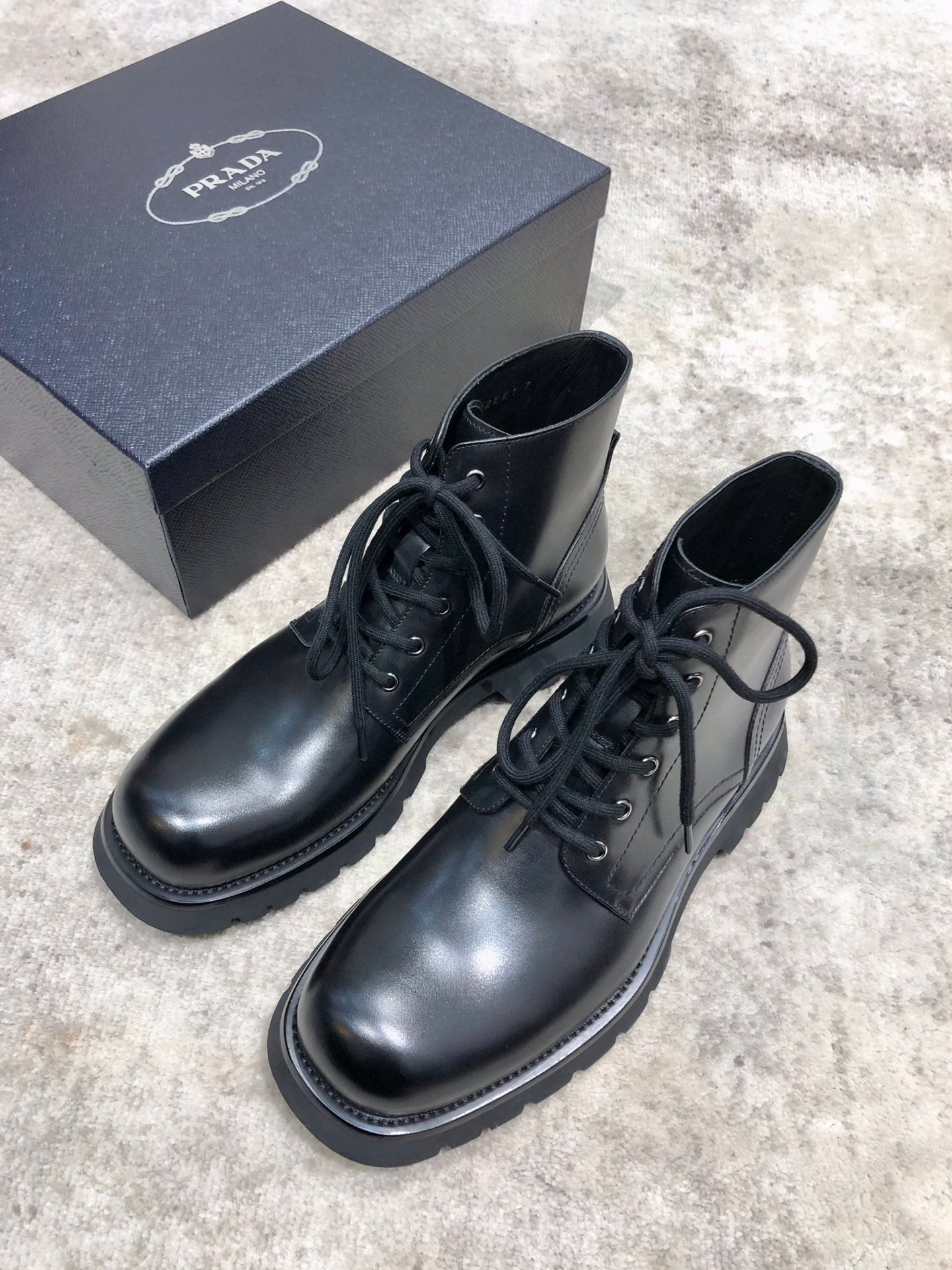 Prada unisex lace-up boots set, black leather with laces and chunky lug sole