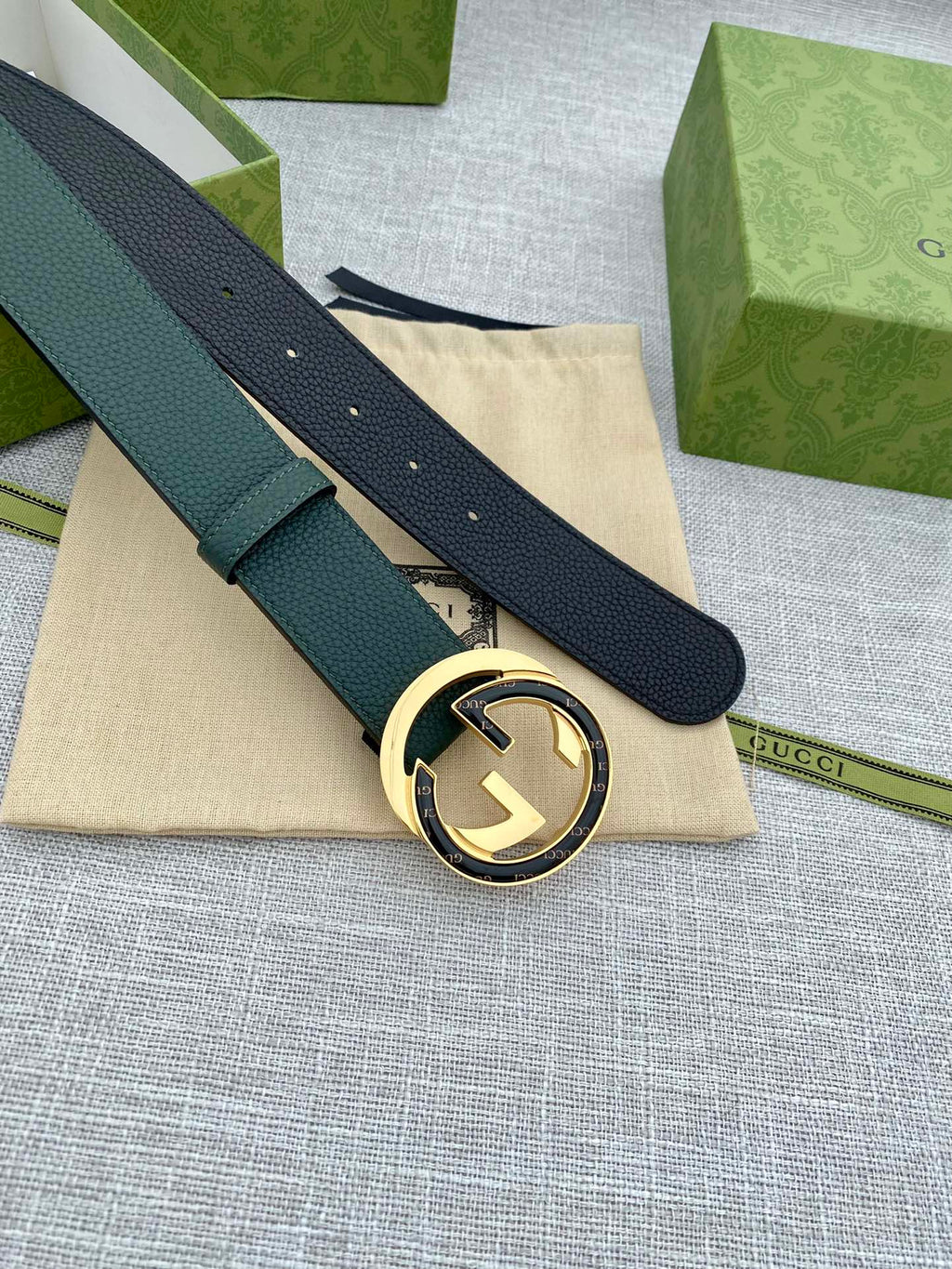 Gucci belt dark green leather with round GG buckle on folded strap