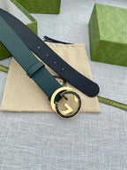 Gucci belt dark green leather with round GG buckle on folded strap